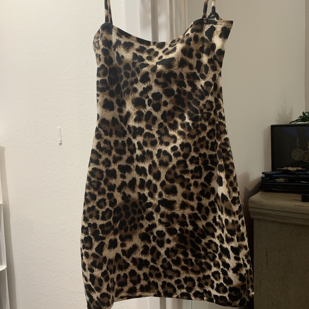 Cheetah print dress by Adriana Sahar